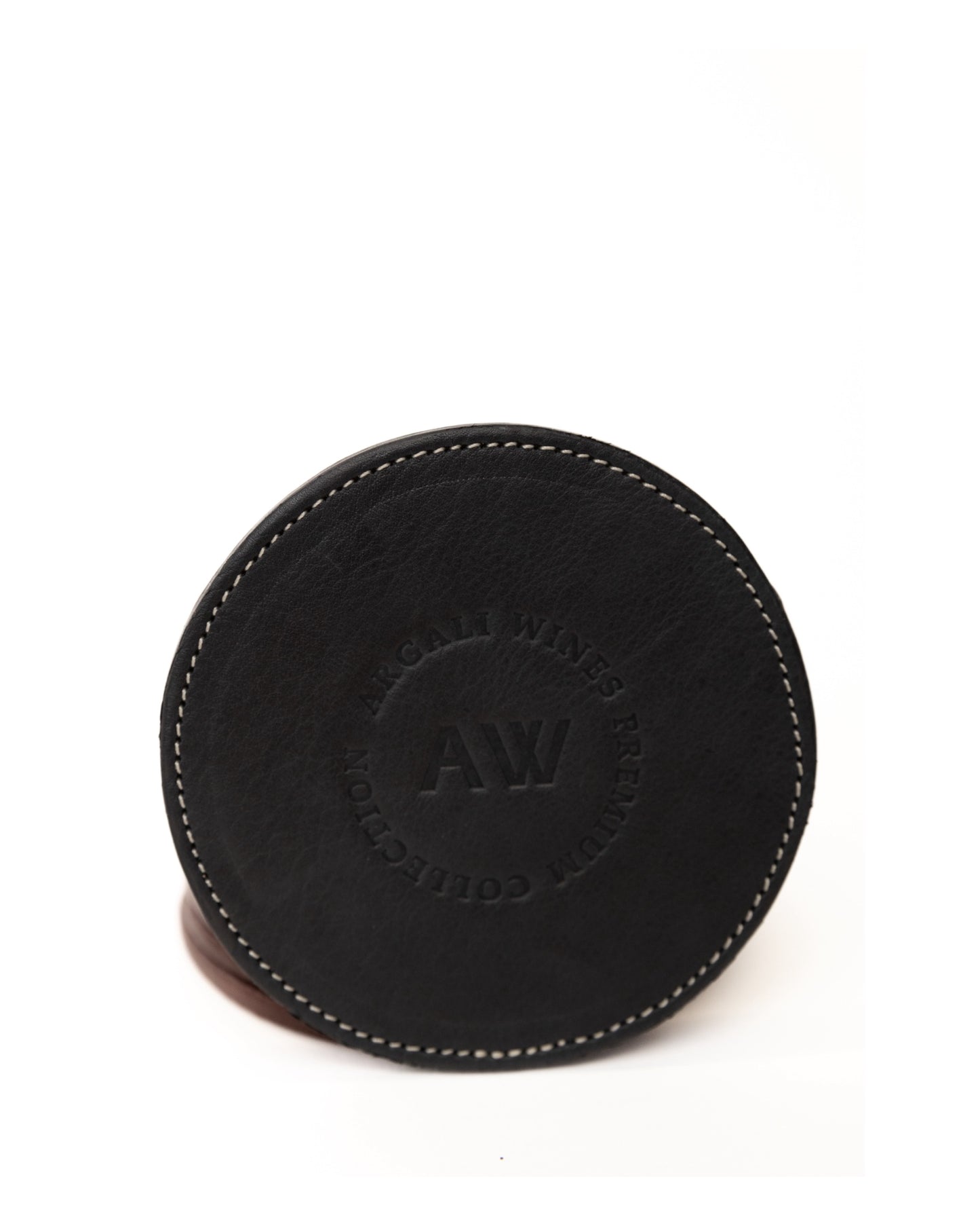 LEATHER COASTERS IN BROWN